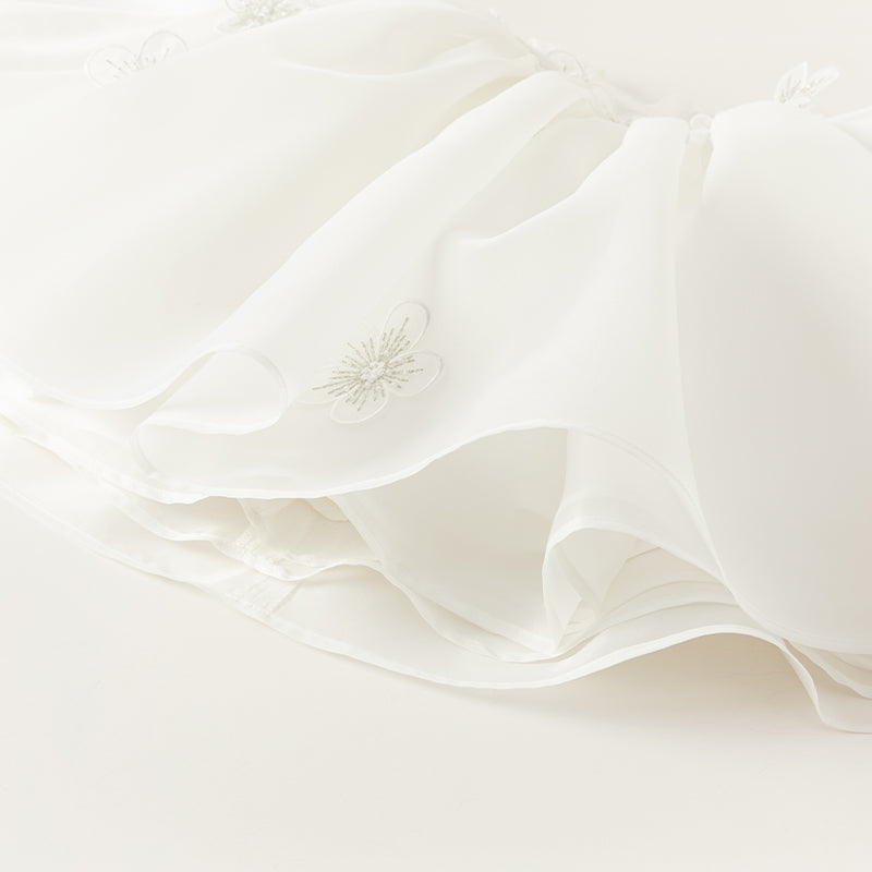 فستان صيفي فاخر للبنات الصغيرات من التول الأبيض بدون أكمام