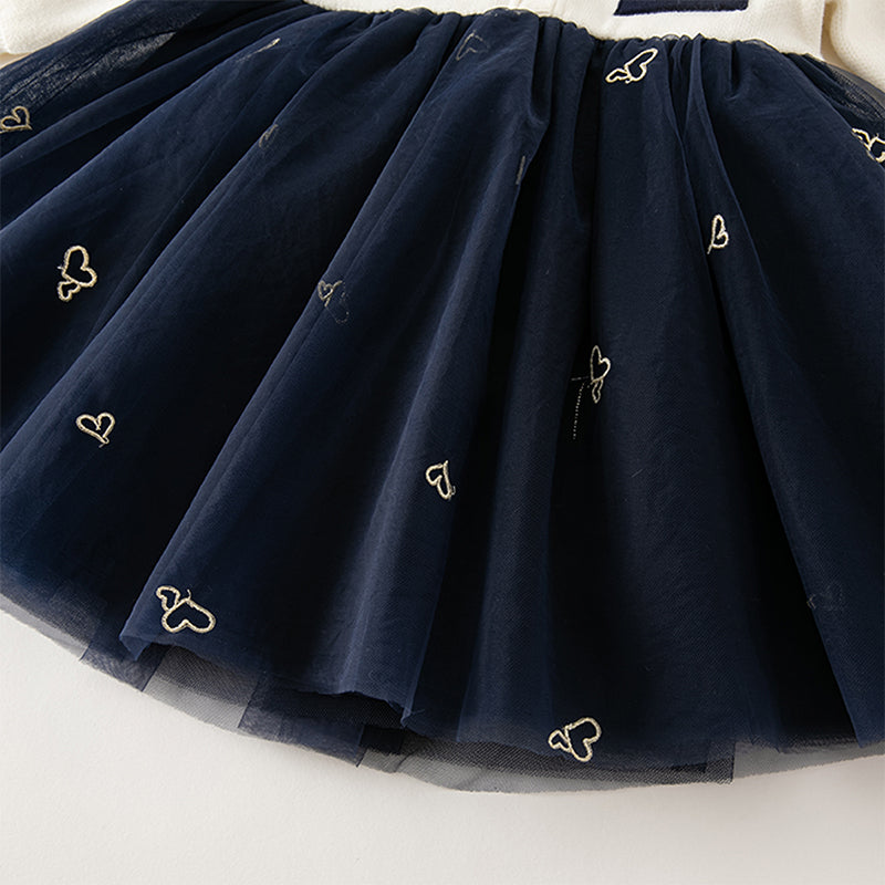 فستان بنات طويل الأكمام من قماش محبوك باللون البيج مع تنورة تول بأسلوب أميرة