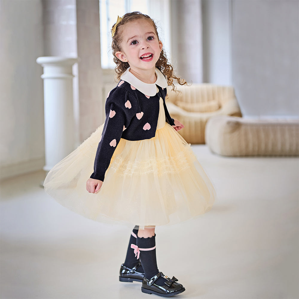 فستان طويل الأكمام للبنات من قماش محبوك باللون الكحلي مع تنورة تول باللون الأصفر بأسلوب أميرة