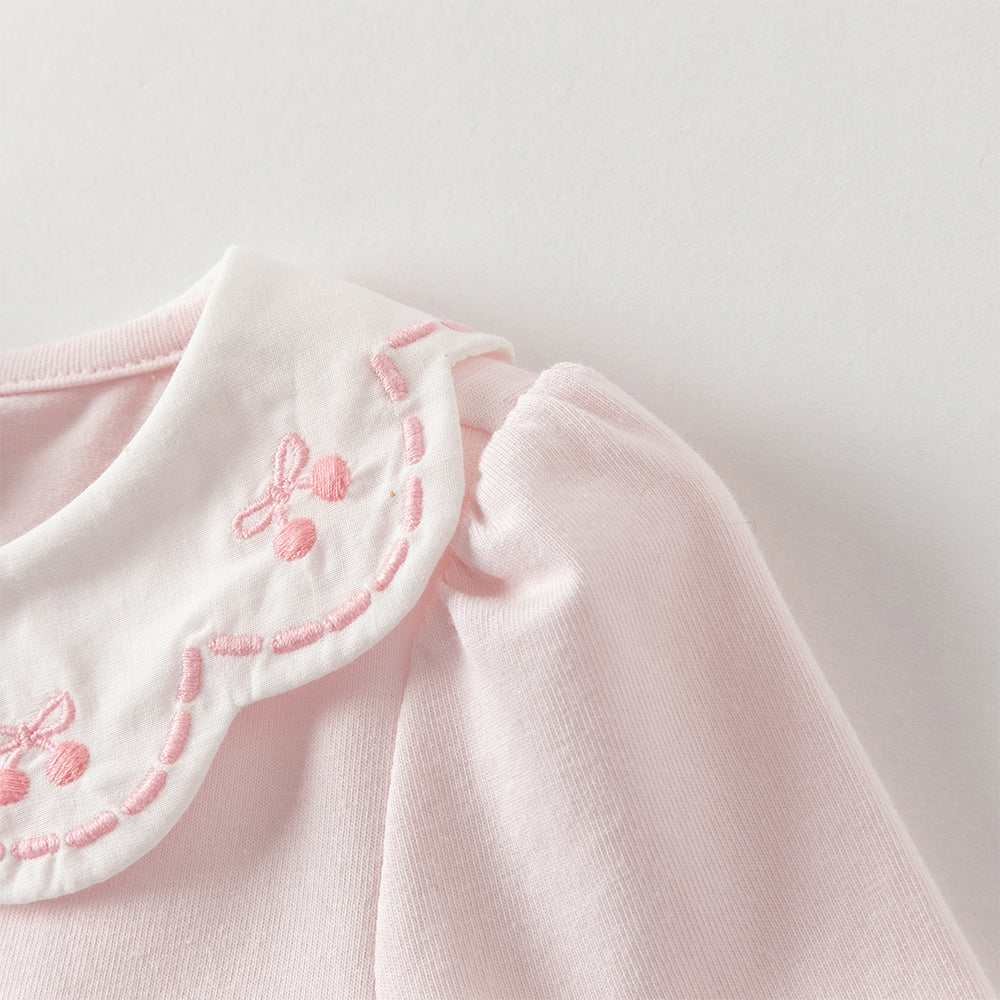 رومبر بناتي للرضّع باللون الوردي الفاتح مع تنورة تول مزينة بالدانتيل
