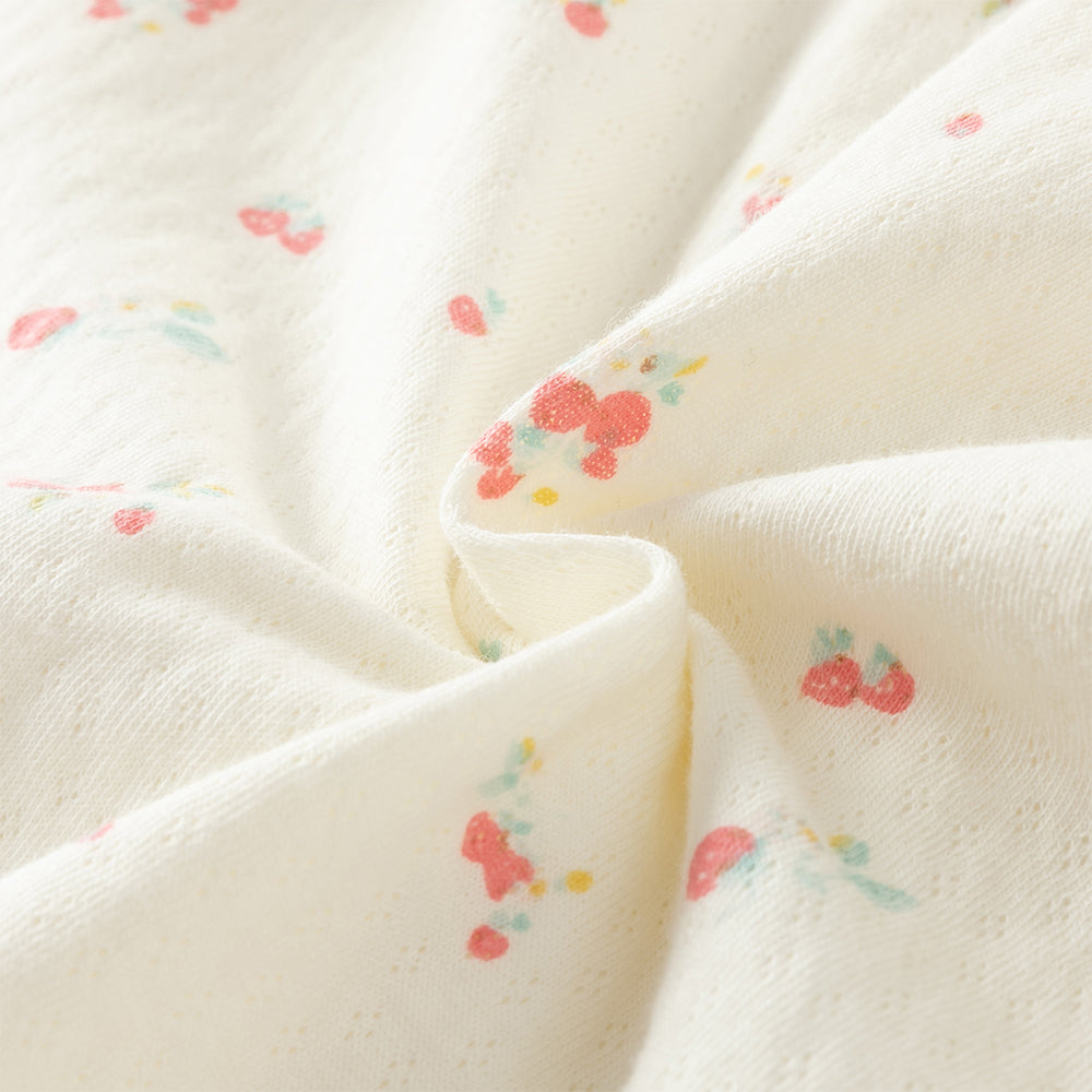 بدلة رومبر قطنية بطبعة زهرية للبنات الرضع، بياقة بيتر بان مزينة بالدانتيل والتطريز مع أزرار كبس كاملة