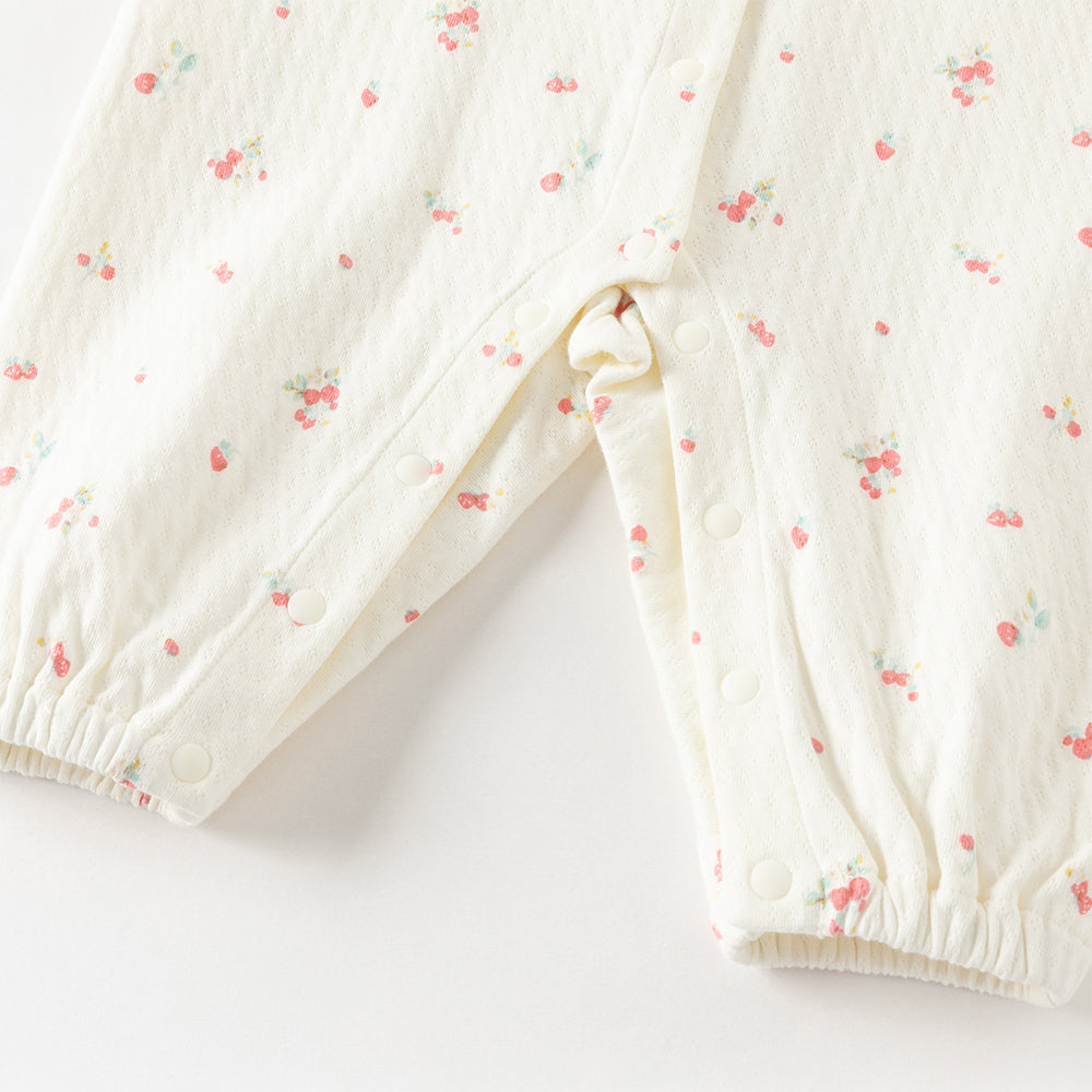 بدلة رومبر قطنية بطبعة زهرية للبنات الرضع، بياقة بيتر بان مزينة بالدانتيل والتطريز مع أزرار كبس كاملة