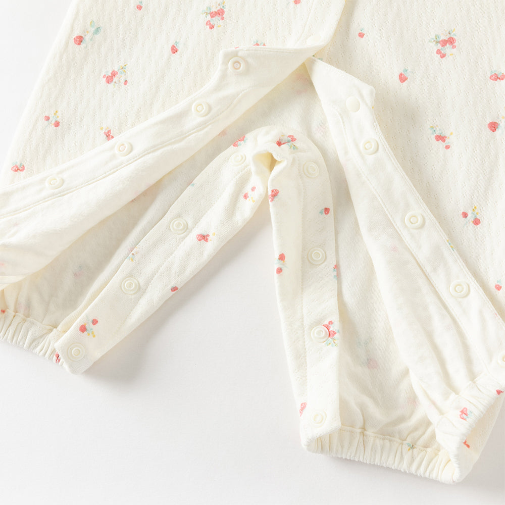 بدلة رومبر قطنية بطبعة زهرية للبنات الرضع، بياقة بيتر بان مزينة بالدانتيل والتطريز مع أزرار كبس كاملة