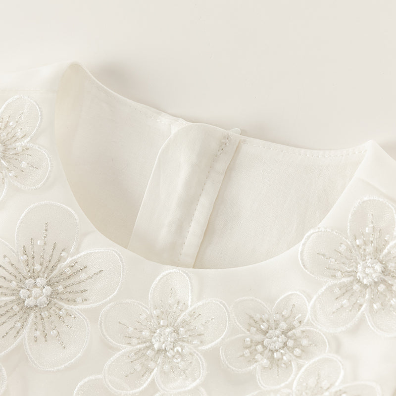 فستان صيفي فاخر للبنات الصغيرات من التول الأبيض بدون أكمام