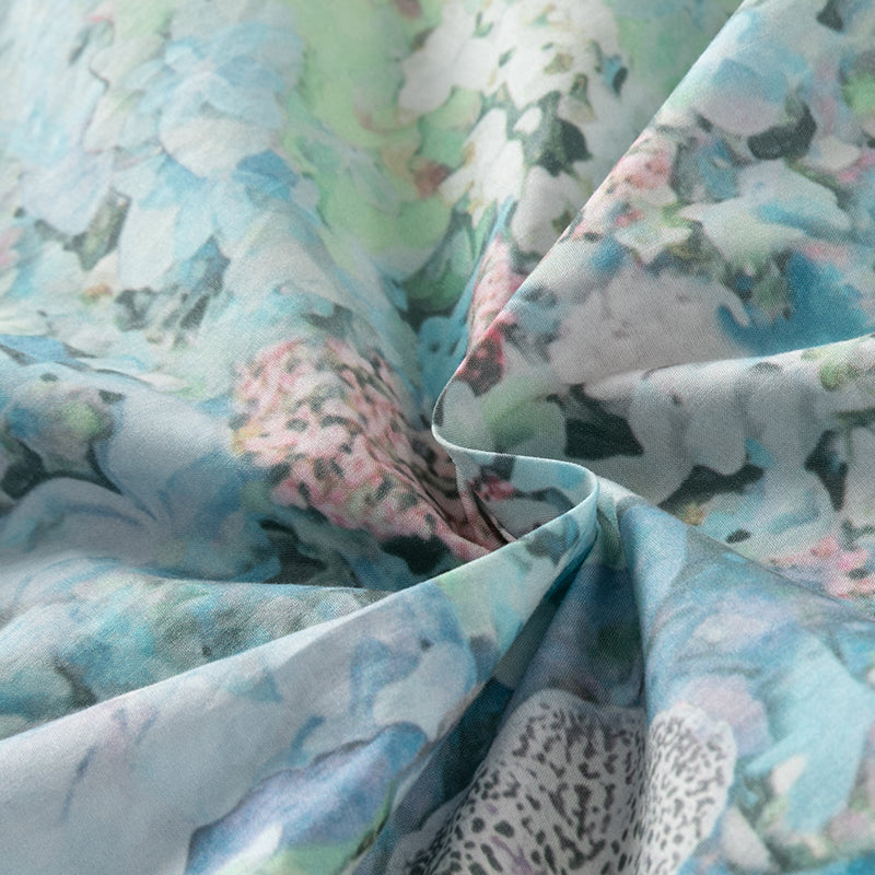 فستان صيفي للبنات الصغيرات بدون أكمام باللون الأزرق الأنيق مع طبعة زهور ومزيج من التول