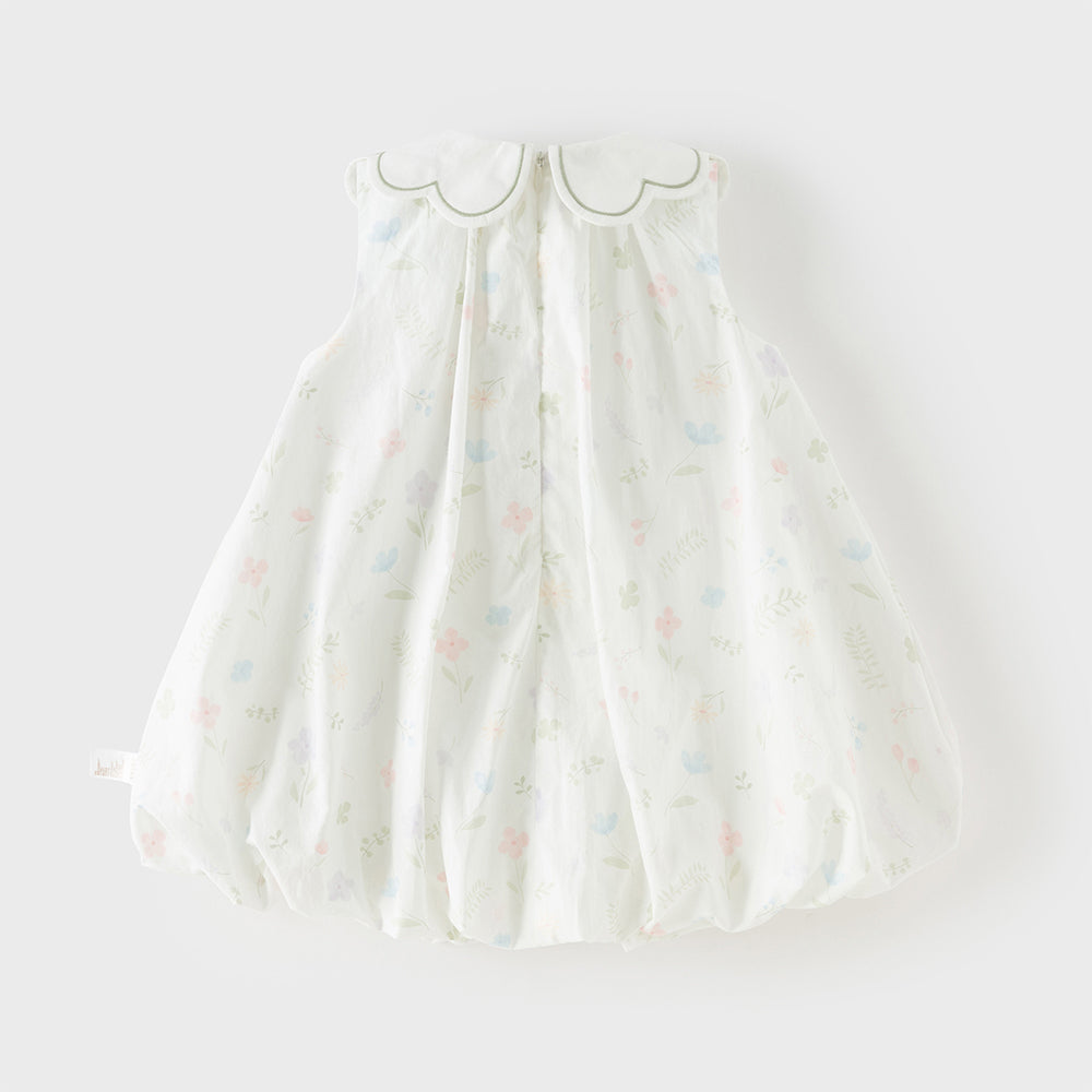 فستان بنات صيفي بدون أكمام بطبعة زهور وياقة بيتر بان بتصميم حافة منتفخة بأسلوب لطيف