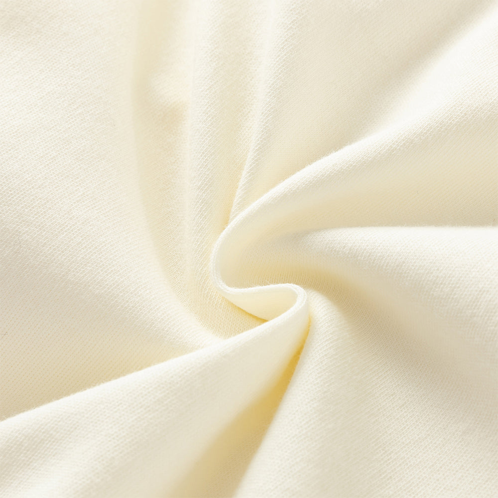 رومبر أطفال من القطن 100% برباط جانبي — متوفر باللون الوردي الفاتح / الأصفر الفاتح / الأزرق الفاتح، مع تطريز دب لطيف