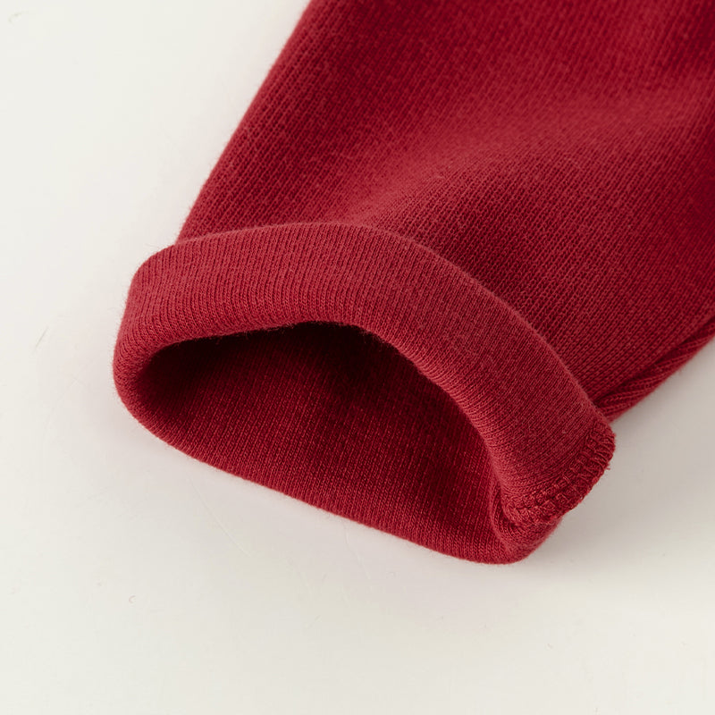 فستان بنات بأكمام طويلة من قماش محبوك باللون الخمري مع تنورة تول بأسلوب أميرة