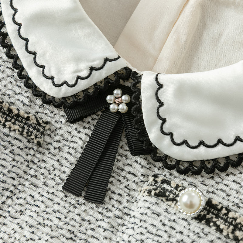 فستان بنات طويل الأكمام من قماش تويد أسود وأبيض مع تنورة تول باللون البيج بأسلوب أميرة